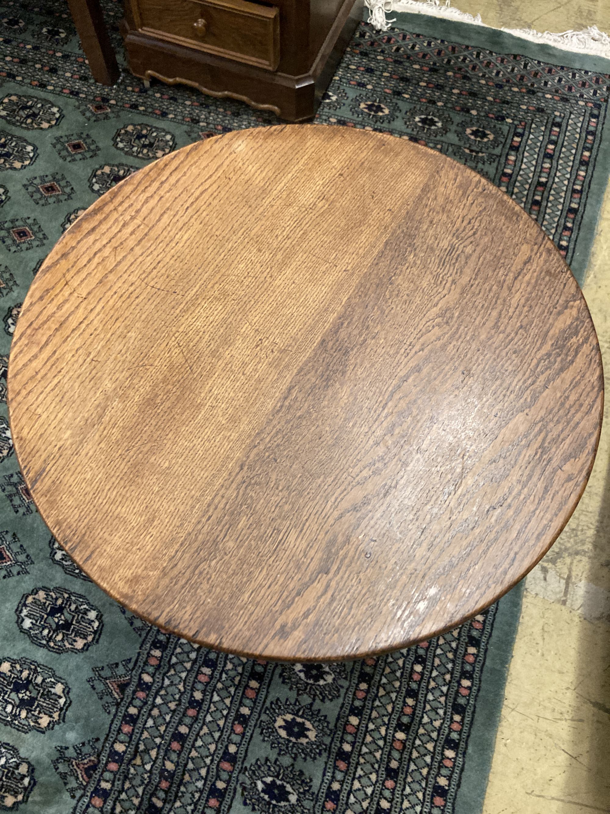 An early 20th century circular oak occasional table, diameter 50cm height 53cm